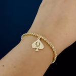QOS Bracelet - Refined Tennis chain Gold close up